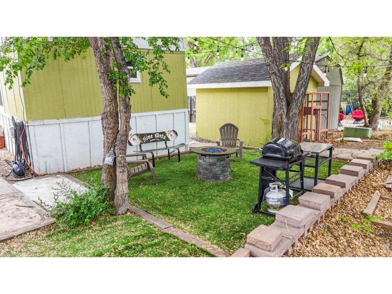 2500 East Harmony Road, Unit 18 Fort Collins, CO 80528 - Photo 29 of 41 a view of a backyard with sitting area