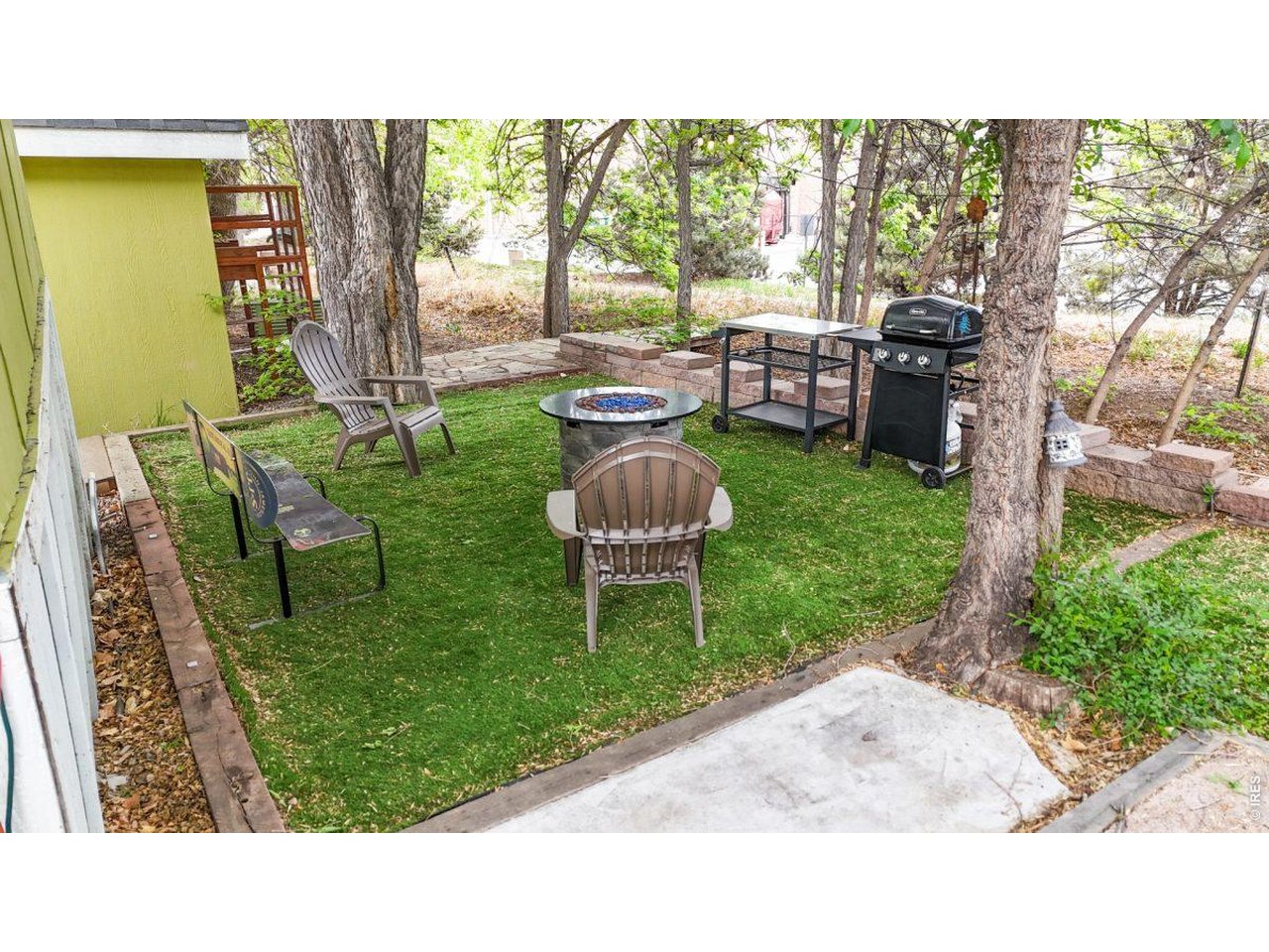 2500 East Harmony Road, Unit 18 Fort Collins, CO 80528 - Photo 31 of 41 a back yard with table and chairs