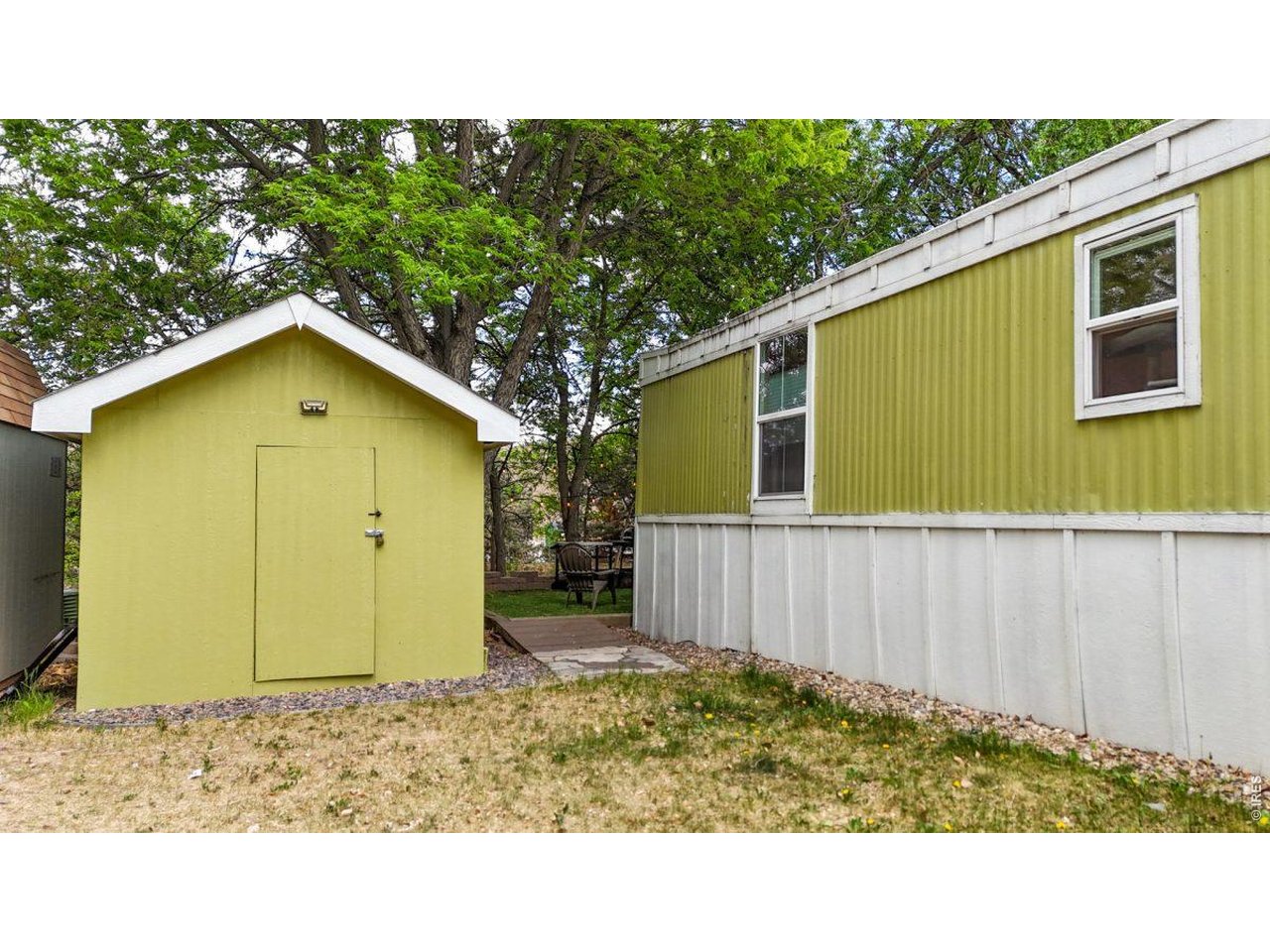2500 East Harmony Road, Unit 18 Fort Collins, CO 80528 - Photo 35 of 41 a house view with a backyard space