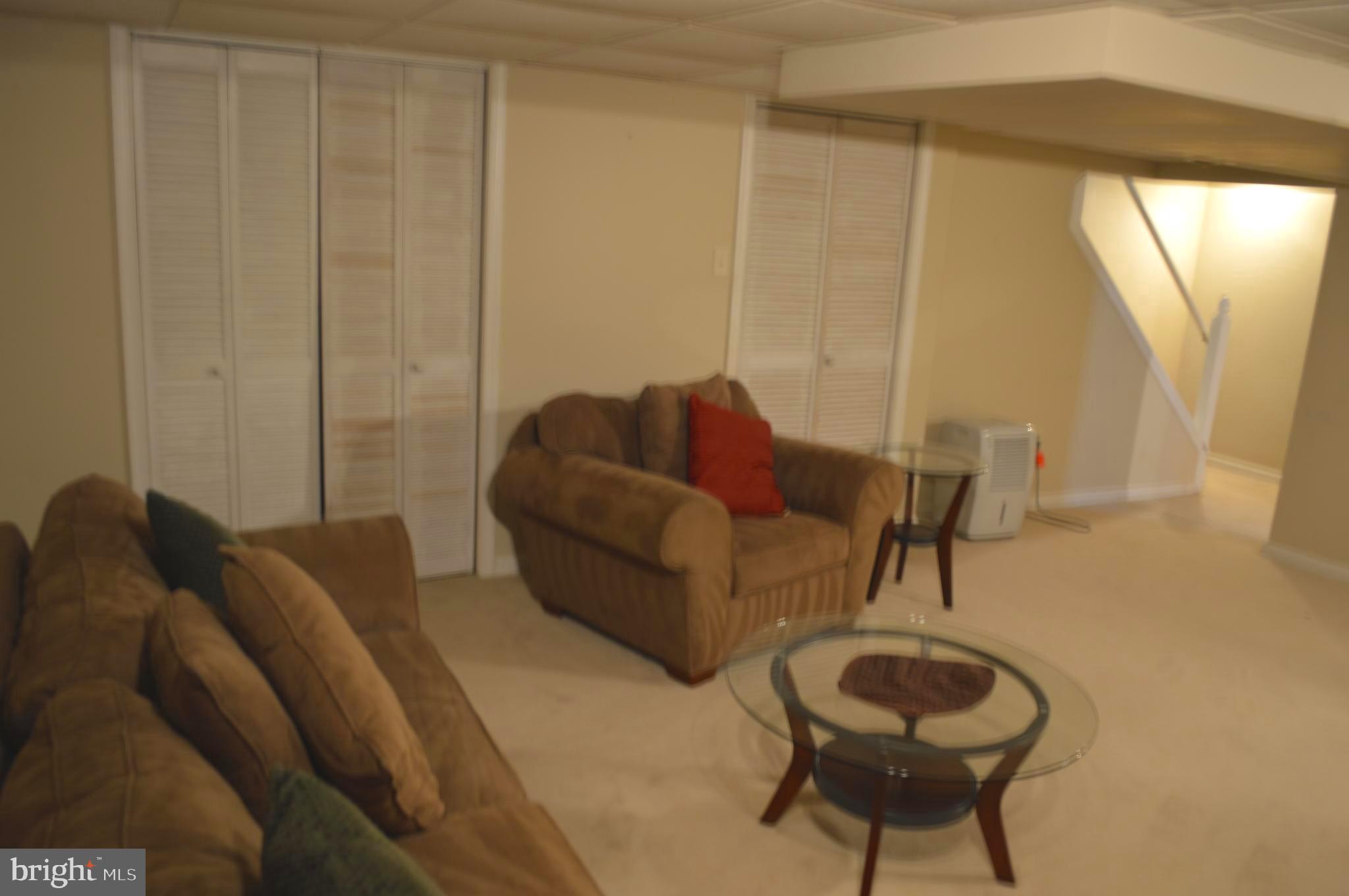 370 Scola Road Brookhaven, PA 19015 - Photo 13 of 23 Family room showing storage closets