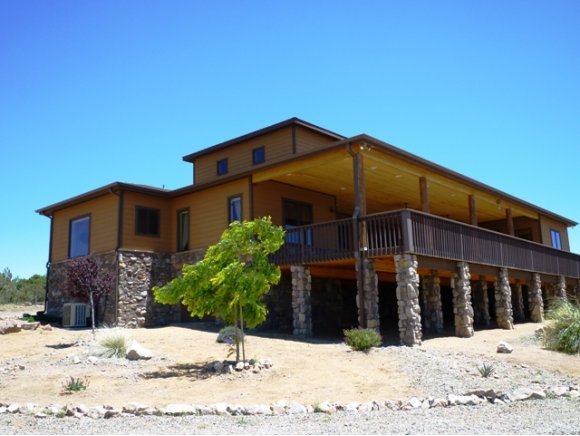 5000 Dillon Wash Road Prescott, AZ 86305 - Photo 1 of 12 a view of a house with snow on the ground
