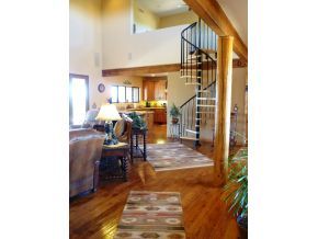 5000 Dillon Wash Road Prescott, AZ 86305 - Photo 2 of 12 a living room with furniture and a chandelier