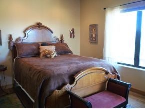 5000 Dillon Wash Road Prescott, AZ 86305 - Photo 6 of 12 a bed sitting in a bedroom next to a window