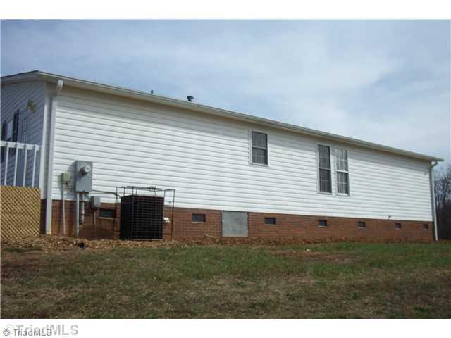 1045 Robin Road Walnut Cove, NC 27052 - Photo 2 of 13 Exterior Back.