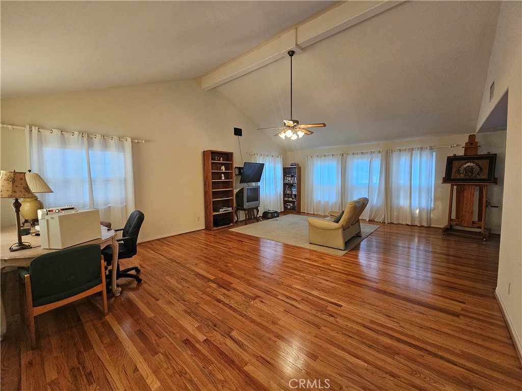 11541 Donovan Road Rossmoor, CA 90720 - Photo 26 of 51 Upstairs vaulted loft/bonus room with hardwood floors