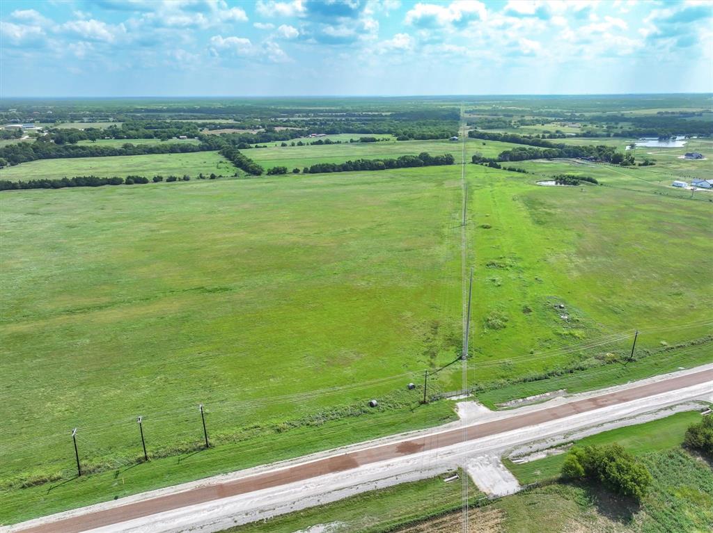 3486 FM 3486, Unit 4 Terrell, TX 75160 - Photo 6 of 15 a view of a field with an ocean view