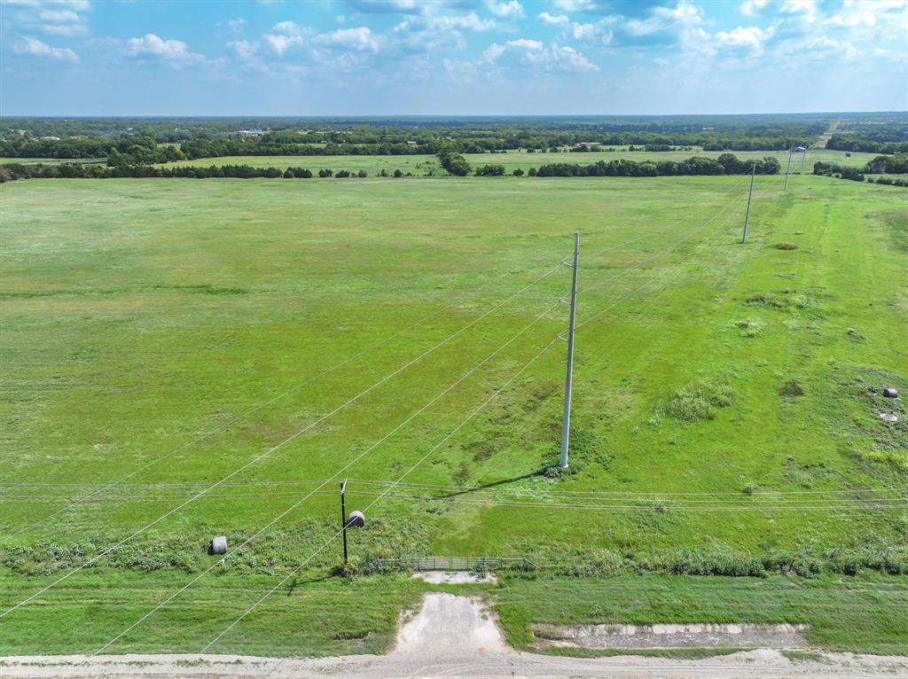3486 FM 3486, Unit 4 Terrell, TX 75160 - Photo 7 of 15 a view of a lake with a big yard