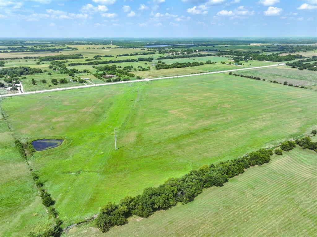 3486 FM 3486, Unit 4 Terrell, TX 75160 - Photo 8 of 15 a view of an ocean and a yard