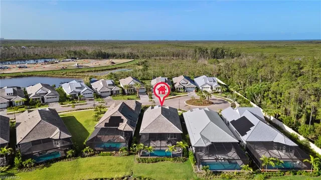 a view of houses with outdoor space and swimming pool