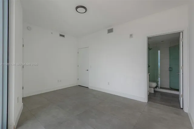 a view of a swimming pool with a yard