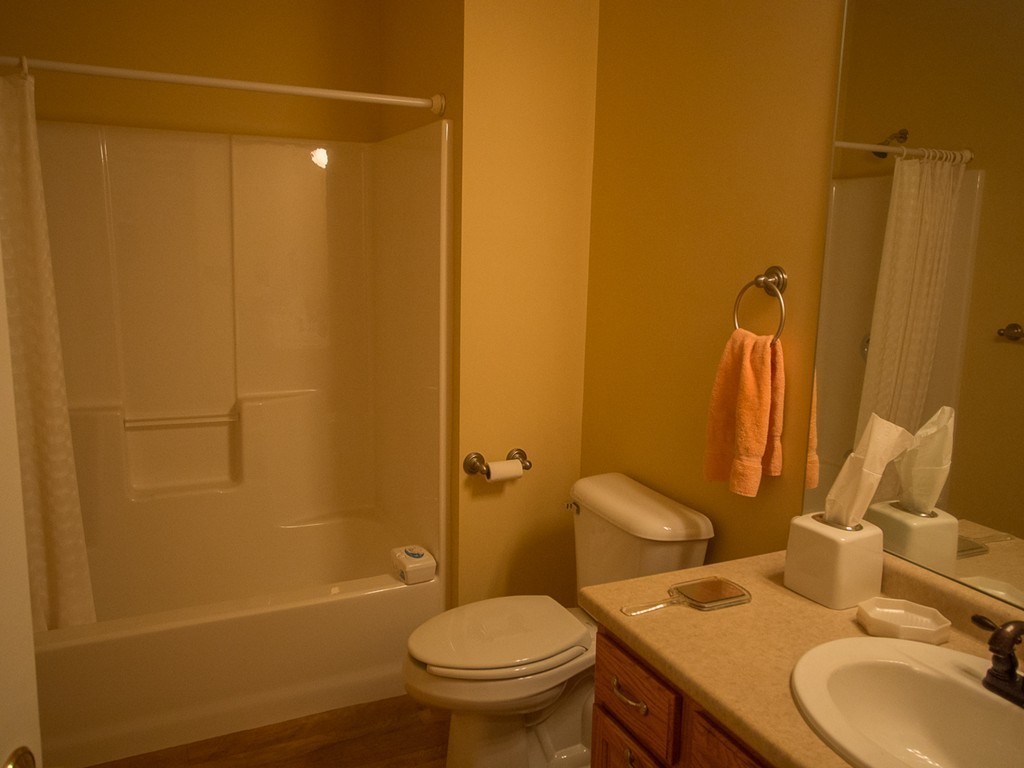 20 Davis Road Westminster, MA 01473 - Photo 19 of 25 a bathroom with a granite countertop toilet sink and mirror