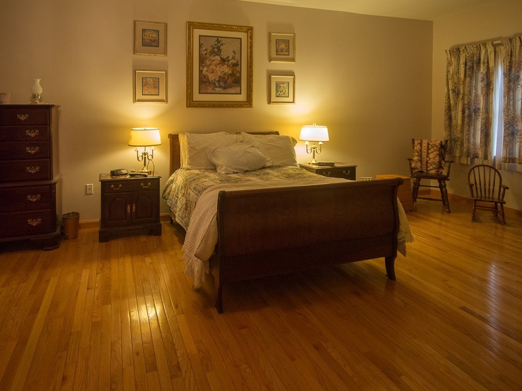 20 Davis Road Westminster, MA 01473 - Photo 21 of 25 a bedroom with a bed and wooden floor