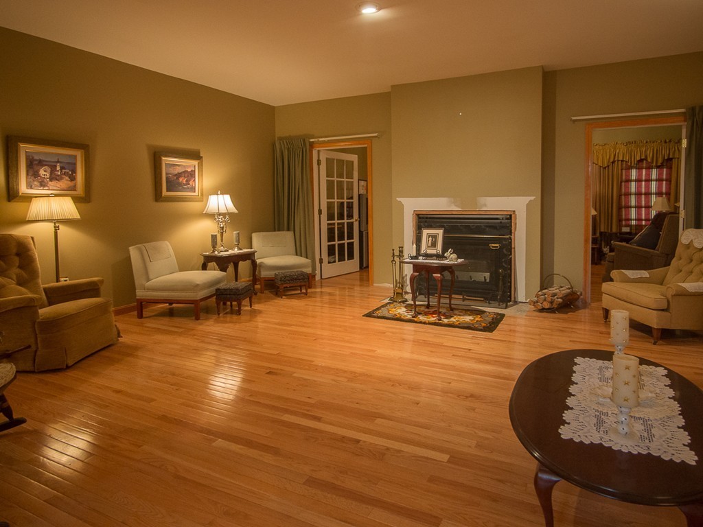 20 Davis Road Westminster, MA 01473 - Photo 9 of 25 a living room with furniture and a fireplace