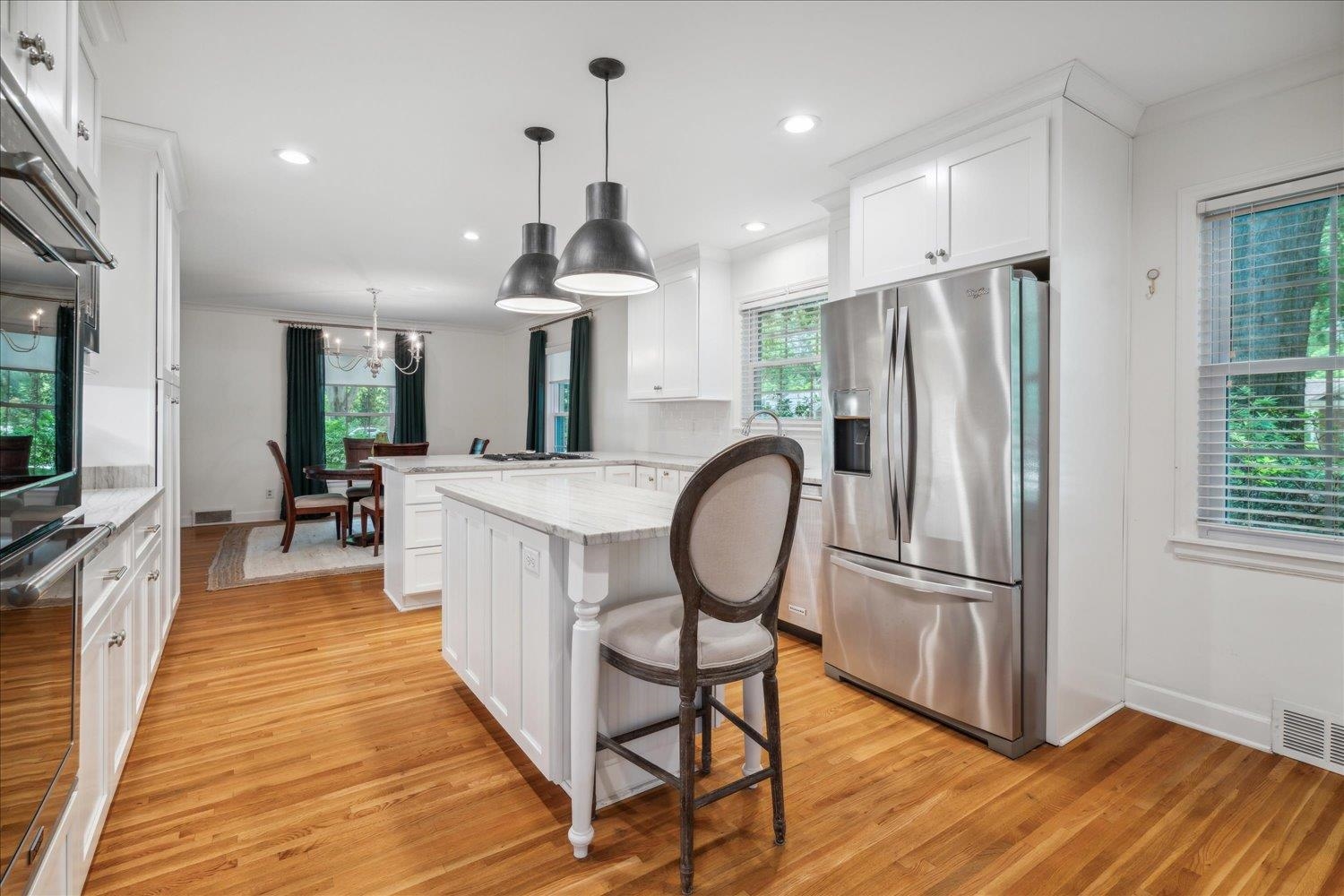 1141 Fair Meadow Road Memphis, TN 38117 - Photo 17 of 40 Kitchen featuring light hardwood / wood-style flooring, a wealth of natural light, and stainless steel refrigerator with ice dispenser