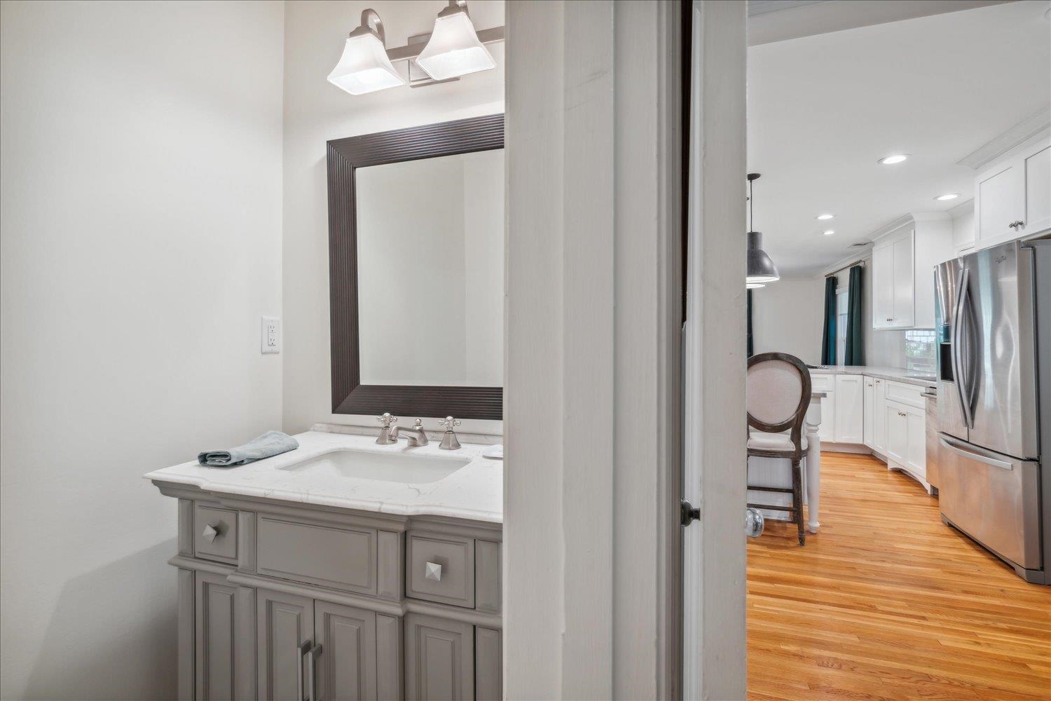 1141 Fair Meadow Road Memphis, TN 38117 - Photo 20 of 40 Bathroom featuring hardwood / wood-style flooring and vanity