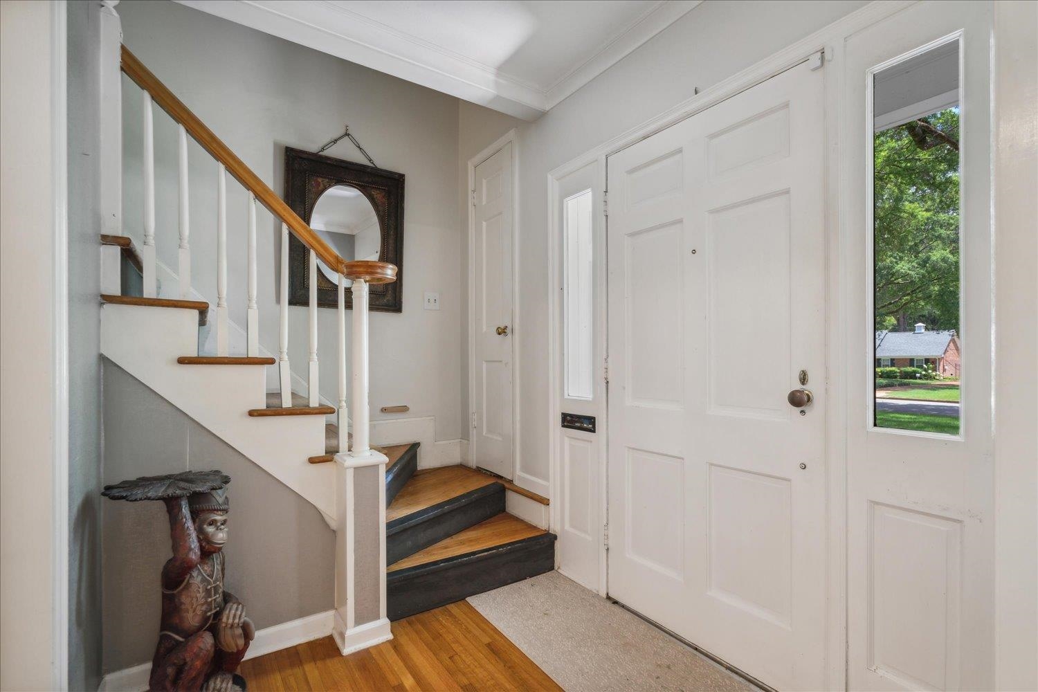 1141 Fair Meadow Road Memphis, TN 38117 - Photo 7 of 40 Entrance foyer featuring crown molding and light hardwood / wood-style floors