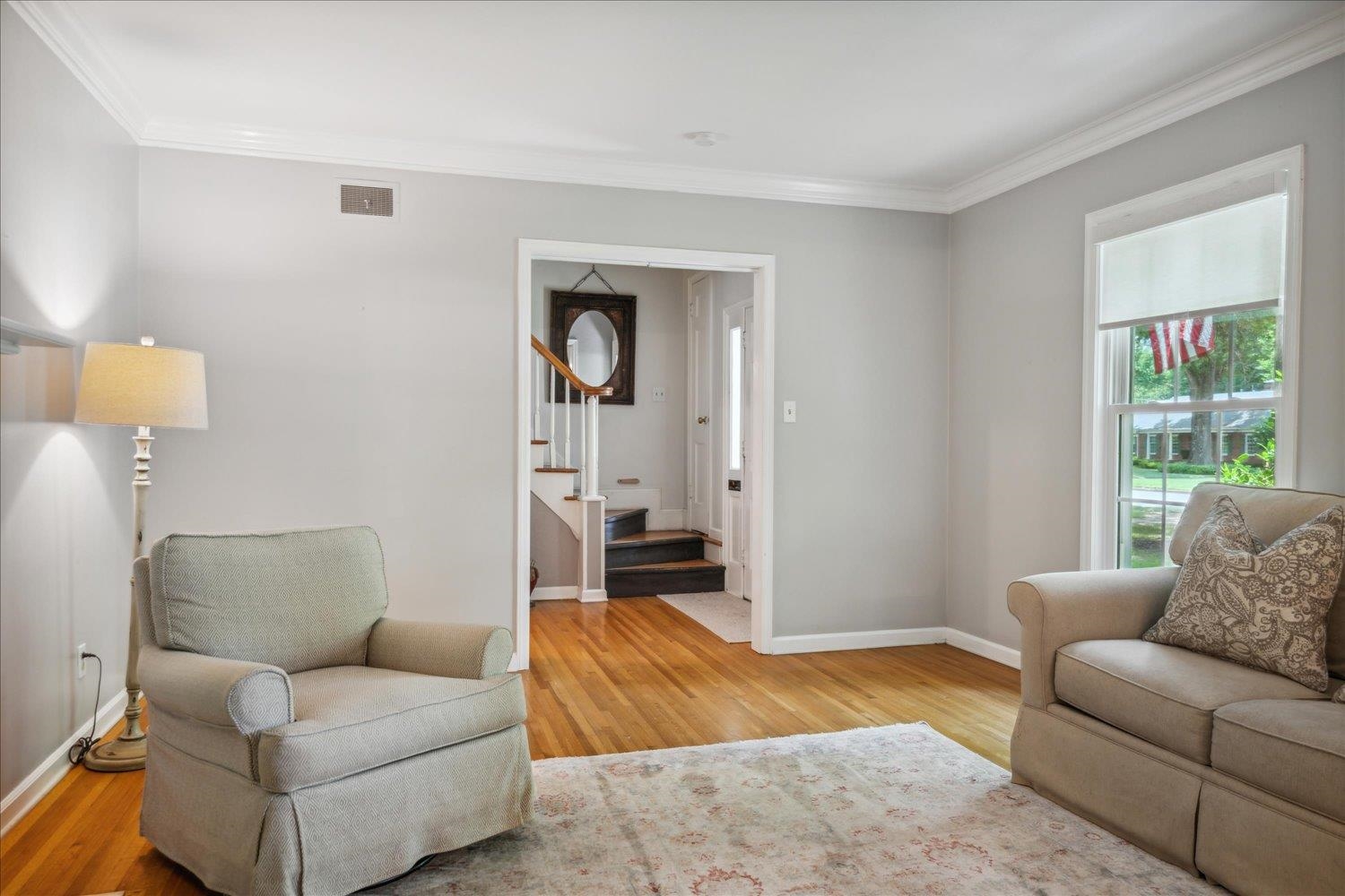 1141 Fair Meadow Road Memphis, TN 38117 - Photo 8 of 40 Living room featuring ornamental molding and wood-type flooring