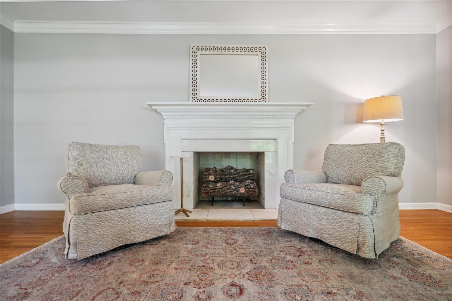 1141 Fair Meadow Road Memphis, TN 38117 - Photo 10 of 40 Sitting room featuring ornamental molding and wood-type flooring