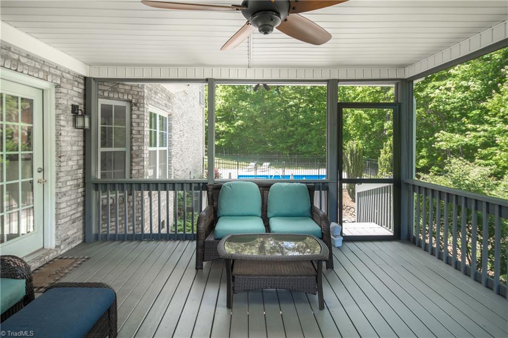 112 Scenic Ridge Place King, NC 27021 - Photo 36 of 47 Screen in porch with pool in the back ground