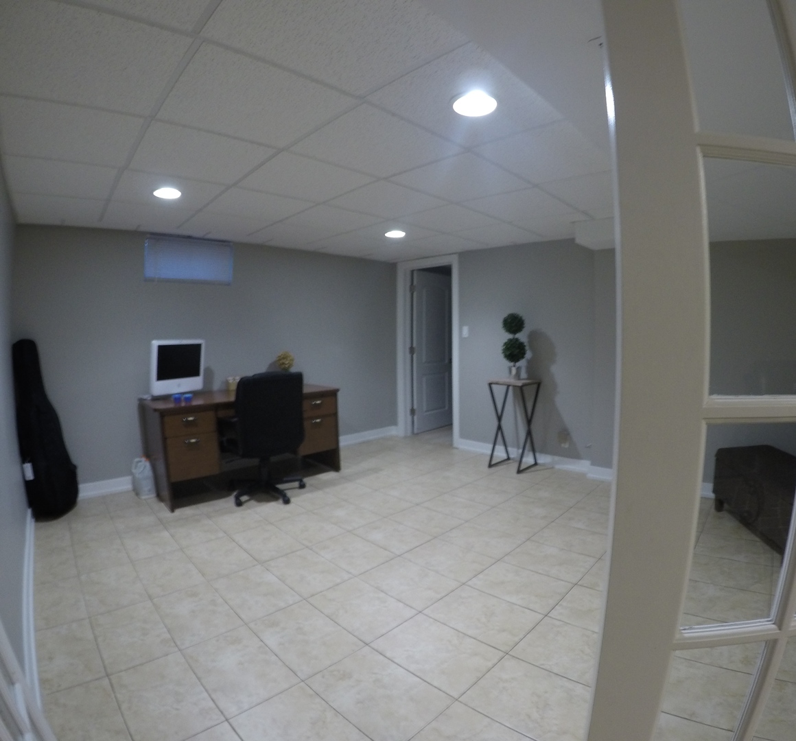 3N445 Rohlwing Road Addison, IL 60101 - Photo 11 of 19 a room with furniture and gym equipment