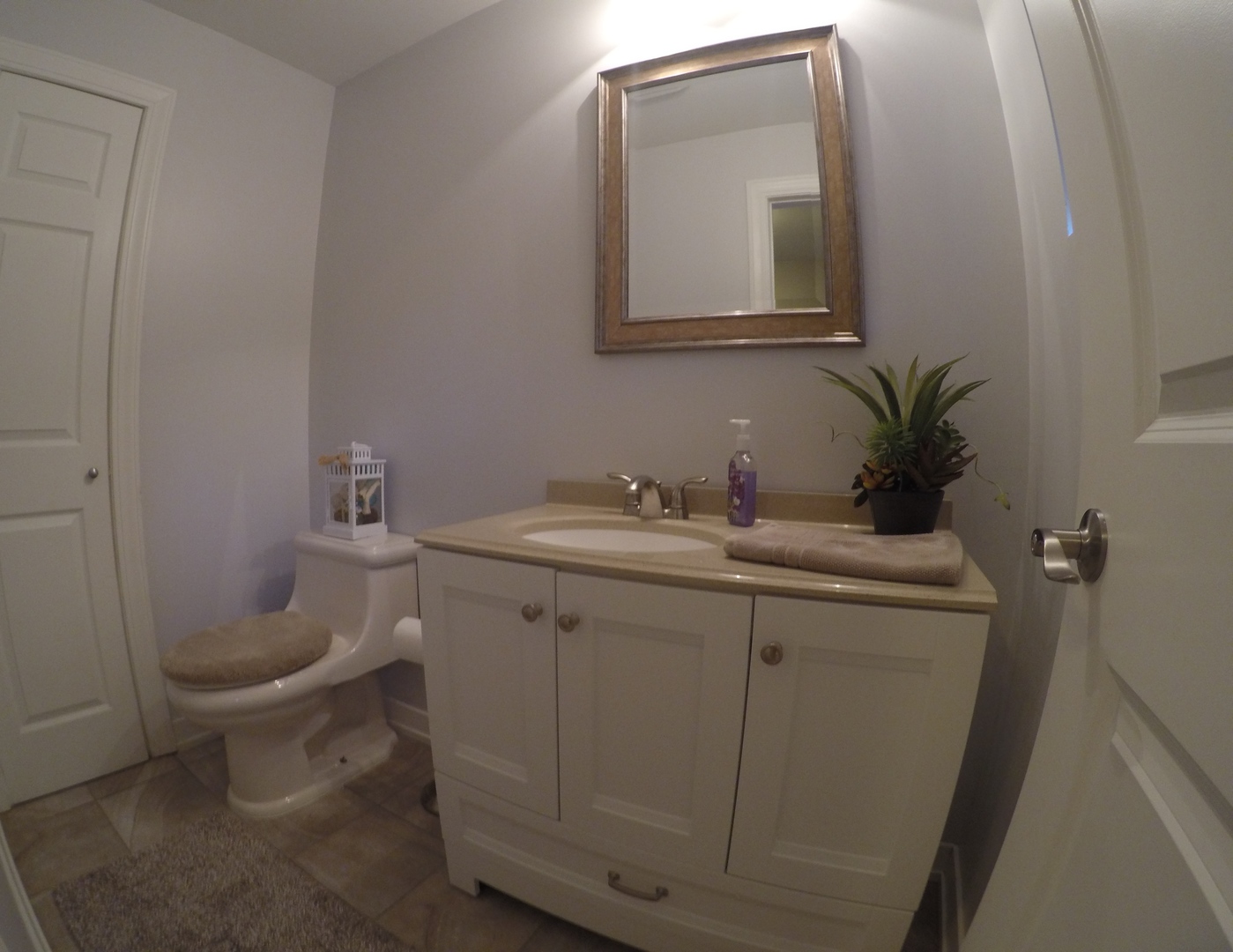3N445 Rohlwing Road Addison, IL 60101 - Photo 15 of 19 a bathroom with a toilet sink and mirror