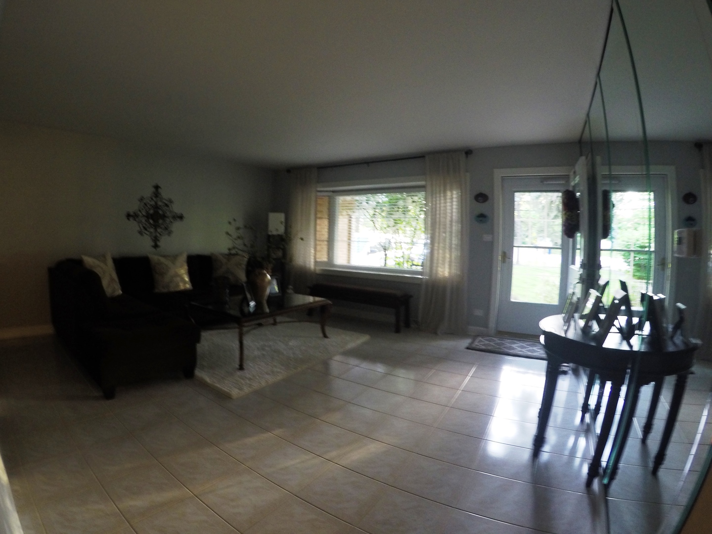 3N445 Rohlwing Road Addison, IL 60101 - Photo 6 of 19 a living room with furniture and a chandelier