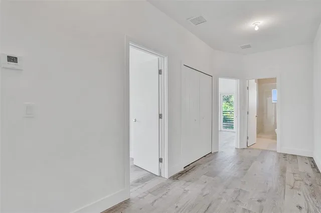 a view of a livingroom with wooden floor
