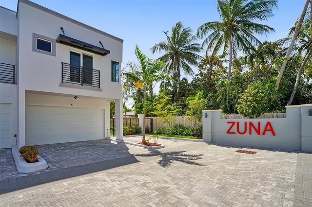 a sign board with parking space