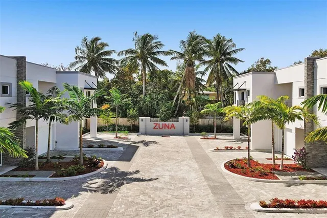 a swimming pool with outdoor seating and yard