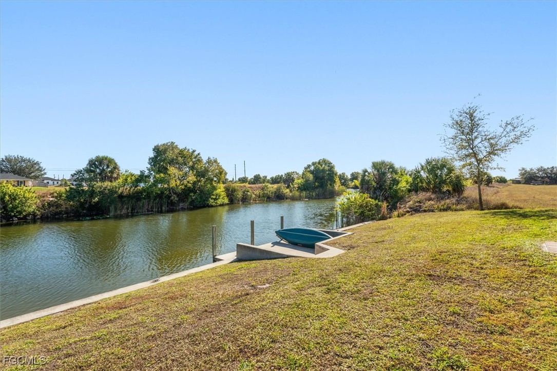 2011 Northwest 9th Place Cape Coral, FL 33993 - Photo 21 of 22 a view of a lake with houses