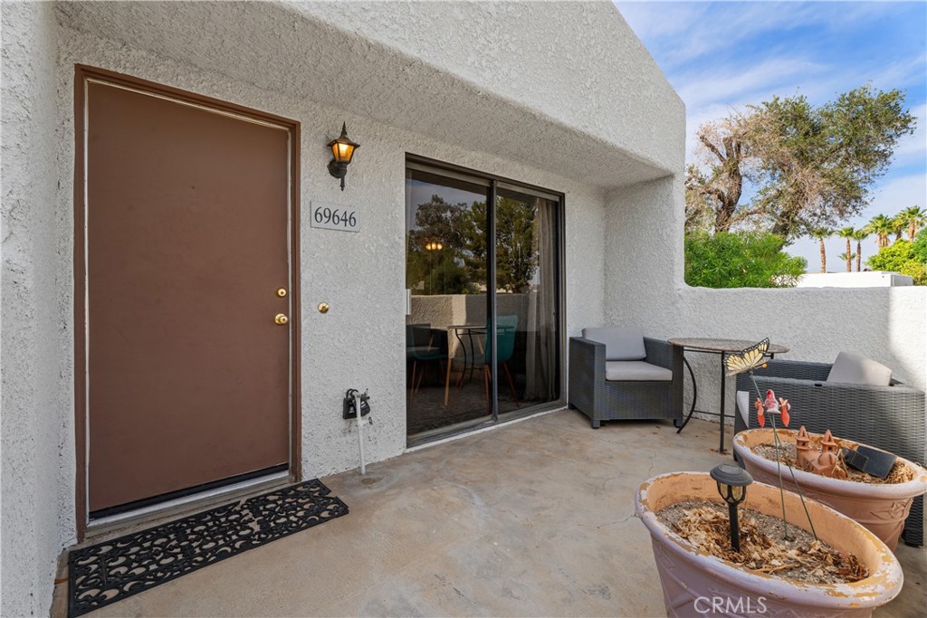 69646 Antonia Way Rancho Mirage, CA 92270 - Photo 12 of 50 a living room with furniture and a window