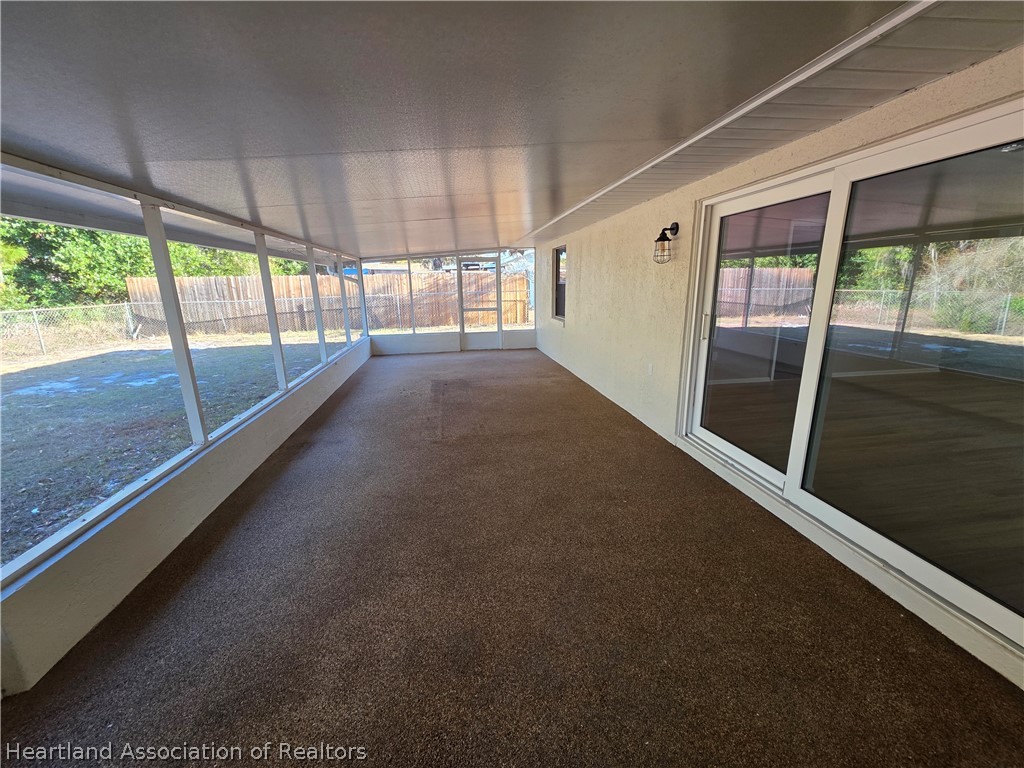 2858 North Lancaster Road Avon Park, FL 33825 - Photo 12 of 13 a view of hallway with stairs