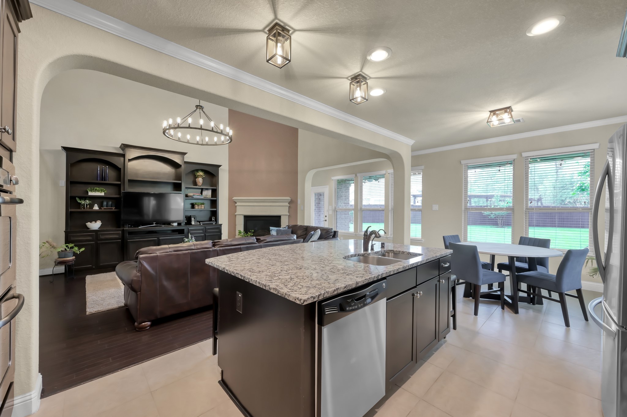 23 Rancher's Trail Tomball, TX 77375 - Photo 10 of 40 This inviting space features a spacious kitchen seamlessly flowing into a cozy family room, perfect for entertaining and everyday living.
