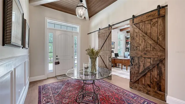 a bed room with bed and a window