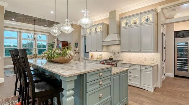 a view of hallway with window and wooden floor