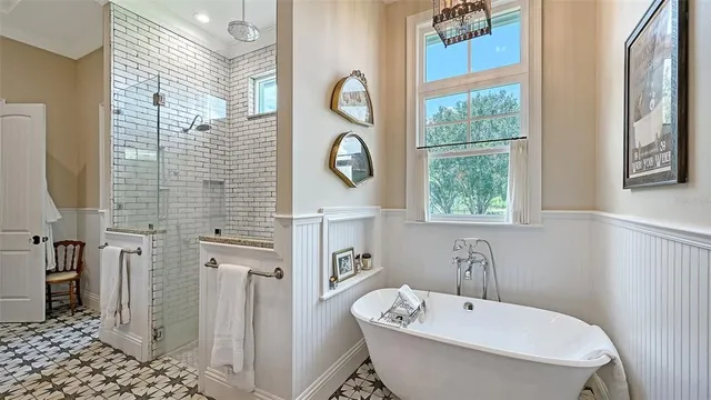 an aerial view of a residential houses with outdoor space