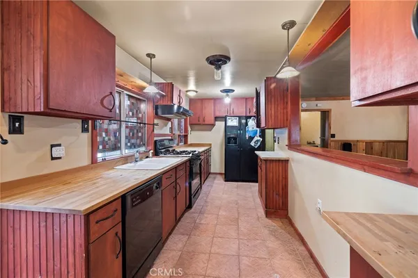 a bathroom with a sink mirror and toilet