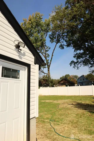 a view of a hall with wooden floor