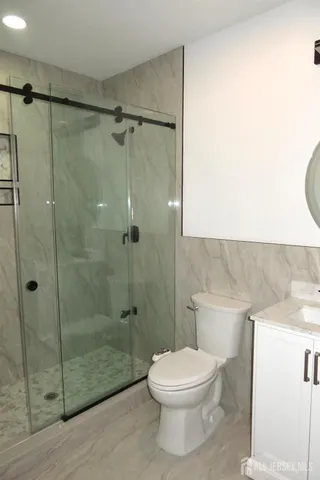 a house view with swimming pool in front of it