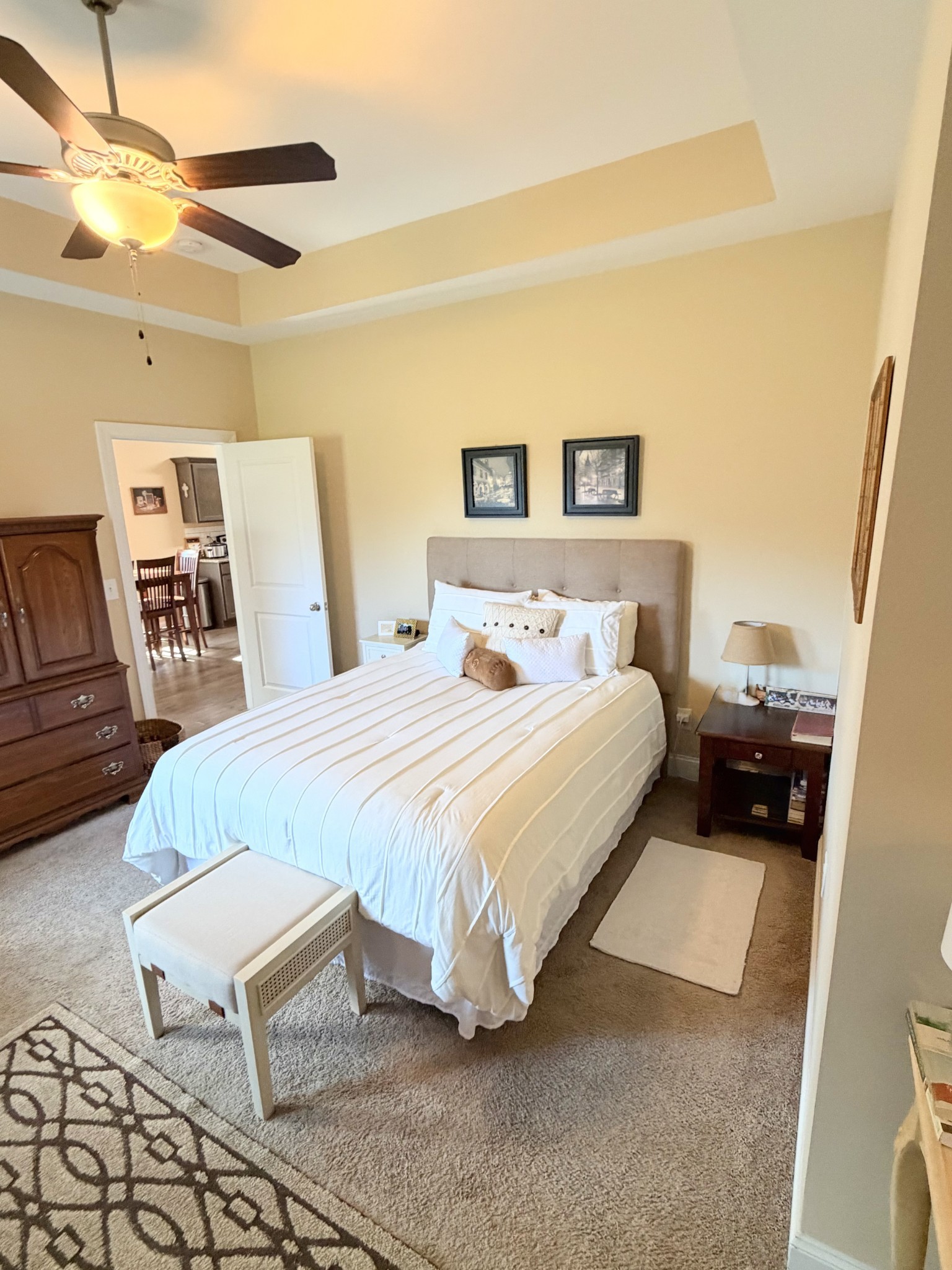 1001 Meadow View Drive Spring Hill, TN 37174 - Photo 19 of 34 a bedroom with a bed and wooden floor