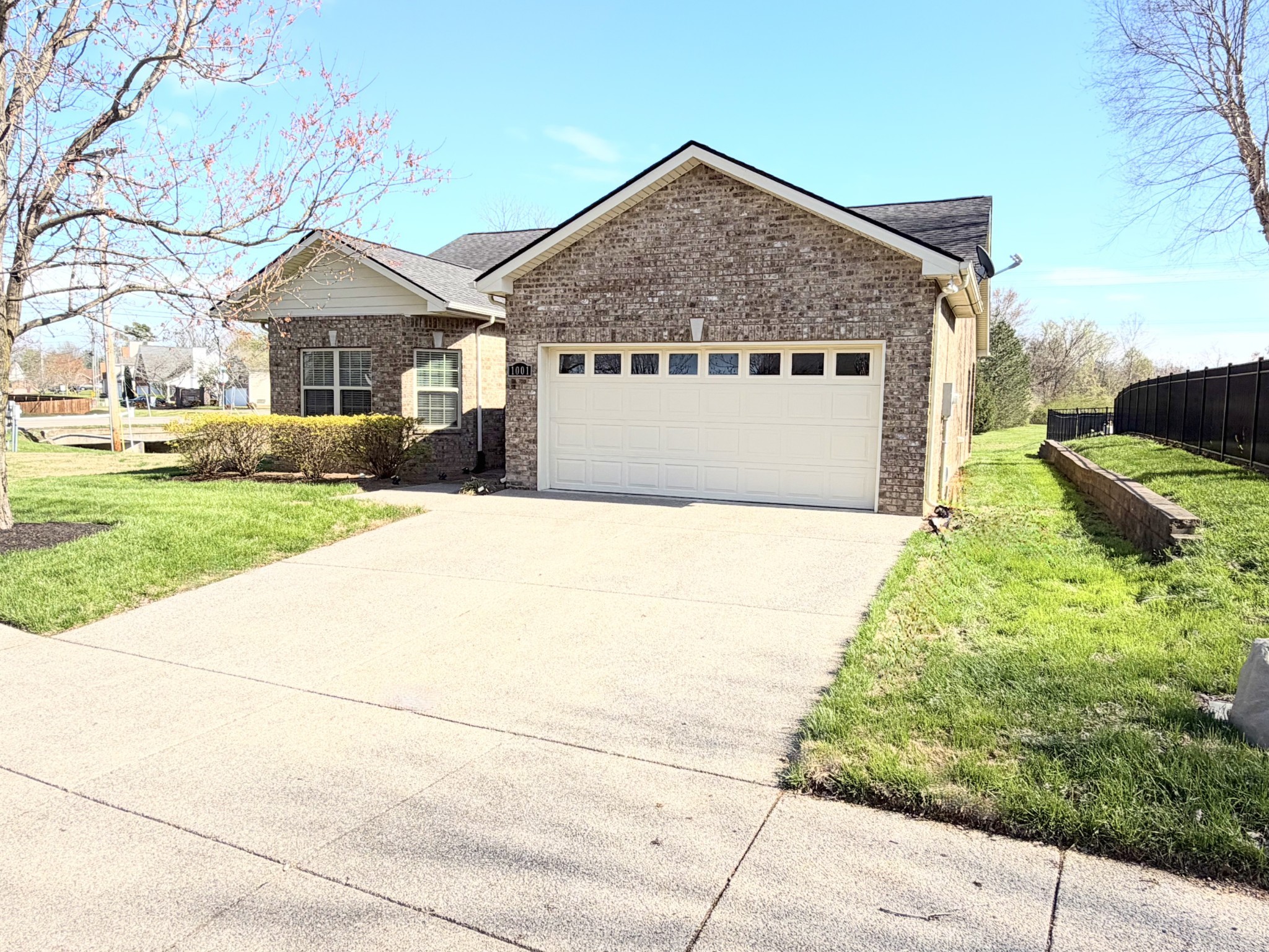 1001 Meadow View Drive Spring Hill, TN 37174 - Photo 3 of 34 a house with trees in the background