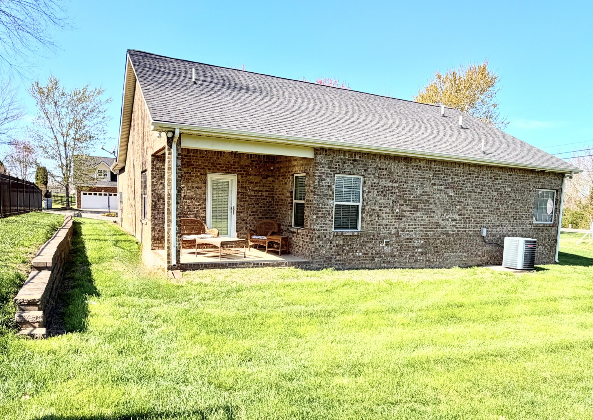 1001 Meadow View Drive Spring Hill, TN 37174 - Photo 32 of 34 a view of a house with swimming pool and a yard