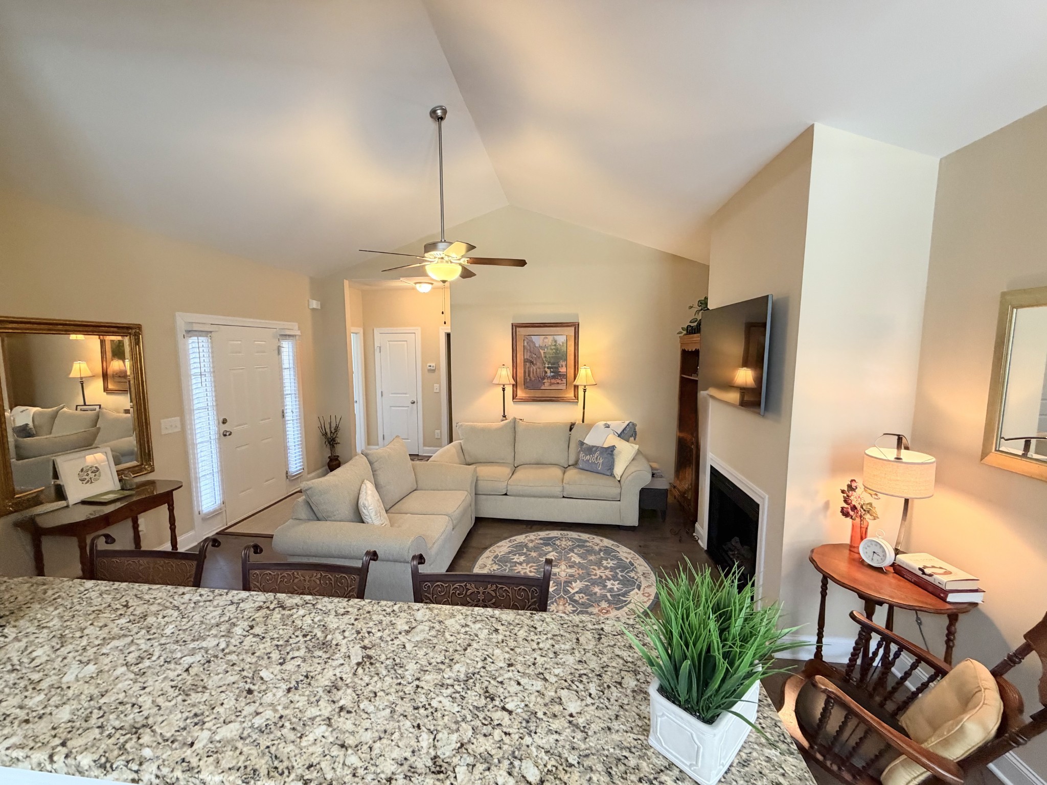 1001 Meadow View Drive Spring Hill, TN 37174 - Photo 7 of 34 a living room with furniture and a chandelier