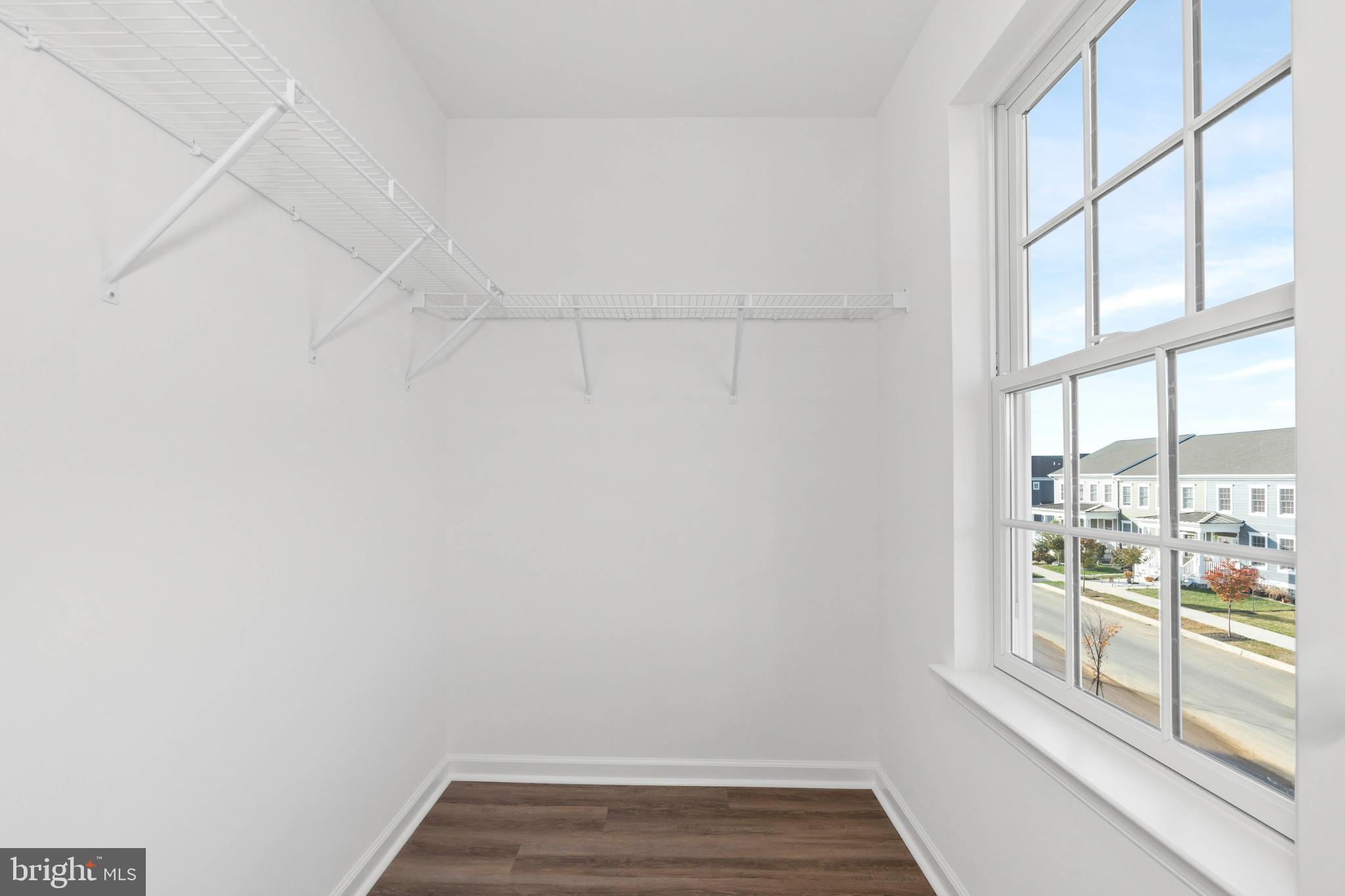852 Mapleton Avenue, Unit 199 Middletown, DE 19709 - Photo 11 of 17 a view of a room with rack on the wall