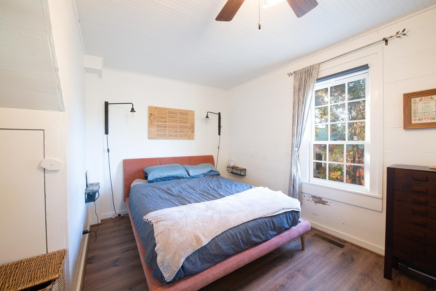 2417 Hodges Road Burlington, NC 27217 - Photo 11 of 30 a bedroom with a bed and wooden floor