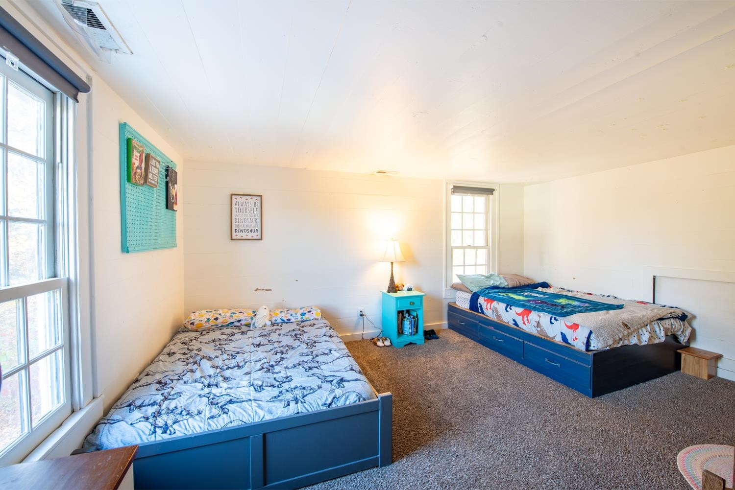 2417 Hodges Road Burlington, NC 27217 - Photo 14 of 30 a bedroom with a bed and a window
