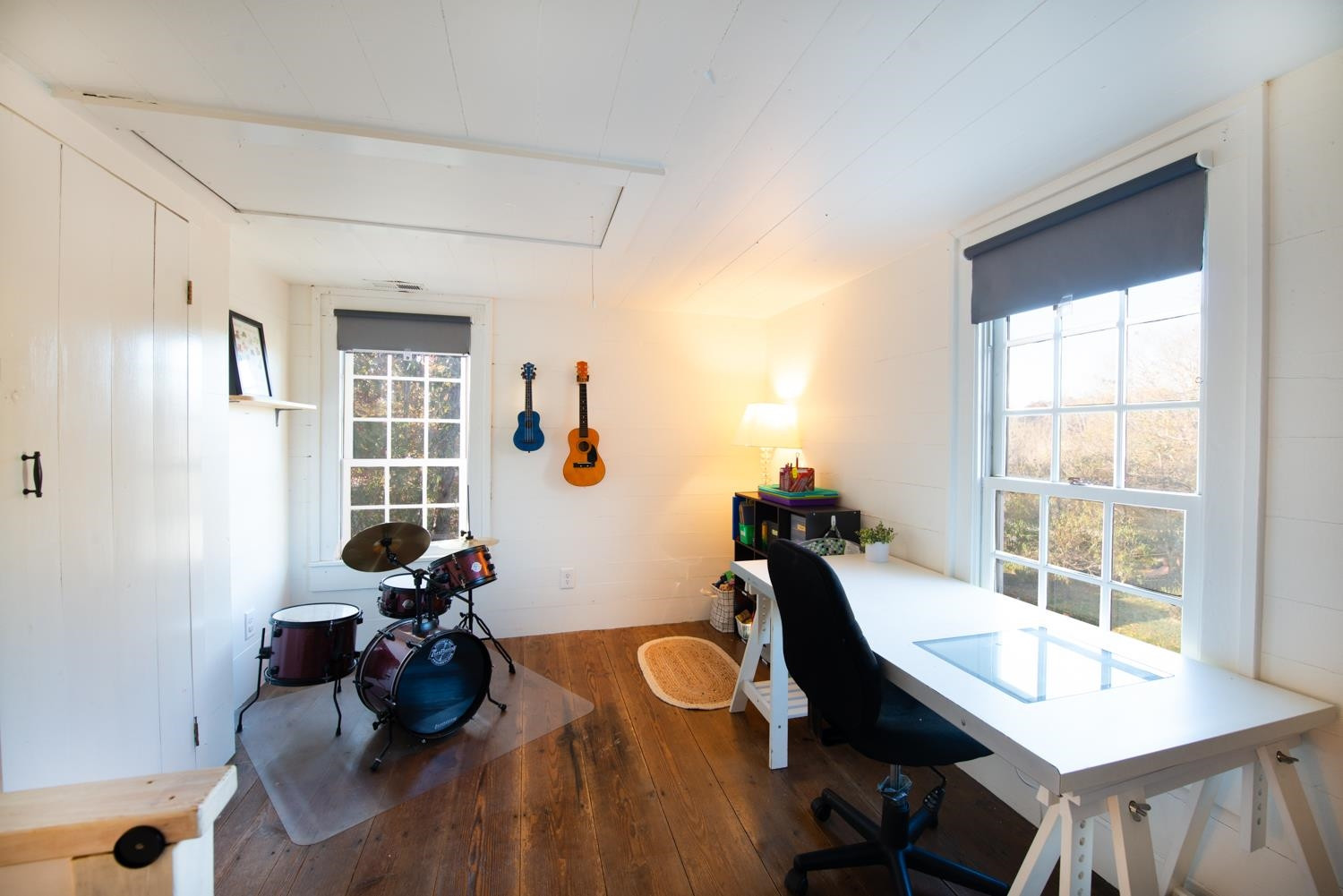 2417 Hodges Road Burlington, NC 27217 - Photo 15 of 30 a view of a workspace with furniture and a window