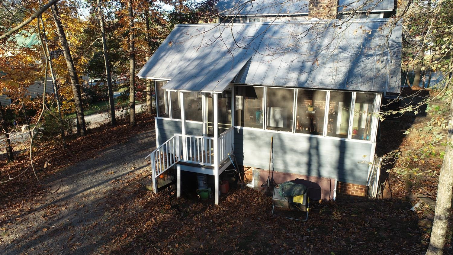 2417 Hodges Road Burlington, NC 27217 - Photo 23 of 30 a view of a chairs with table in the backyard