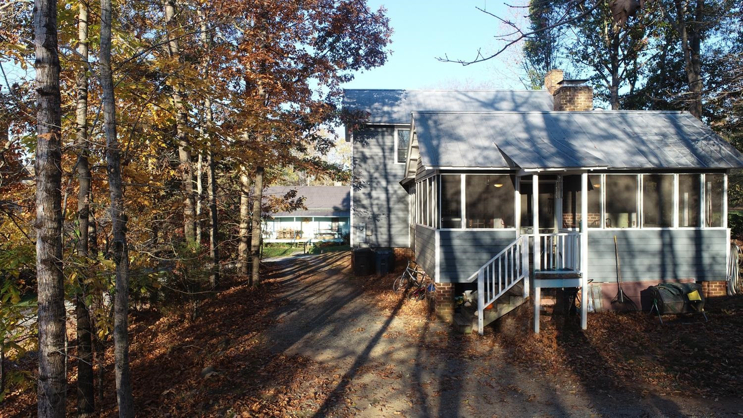 2417 Hodges Road Burlington, NC 27217 - Photo 24 of 30 a view of a house with backyard and sitting area