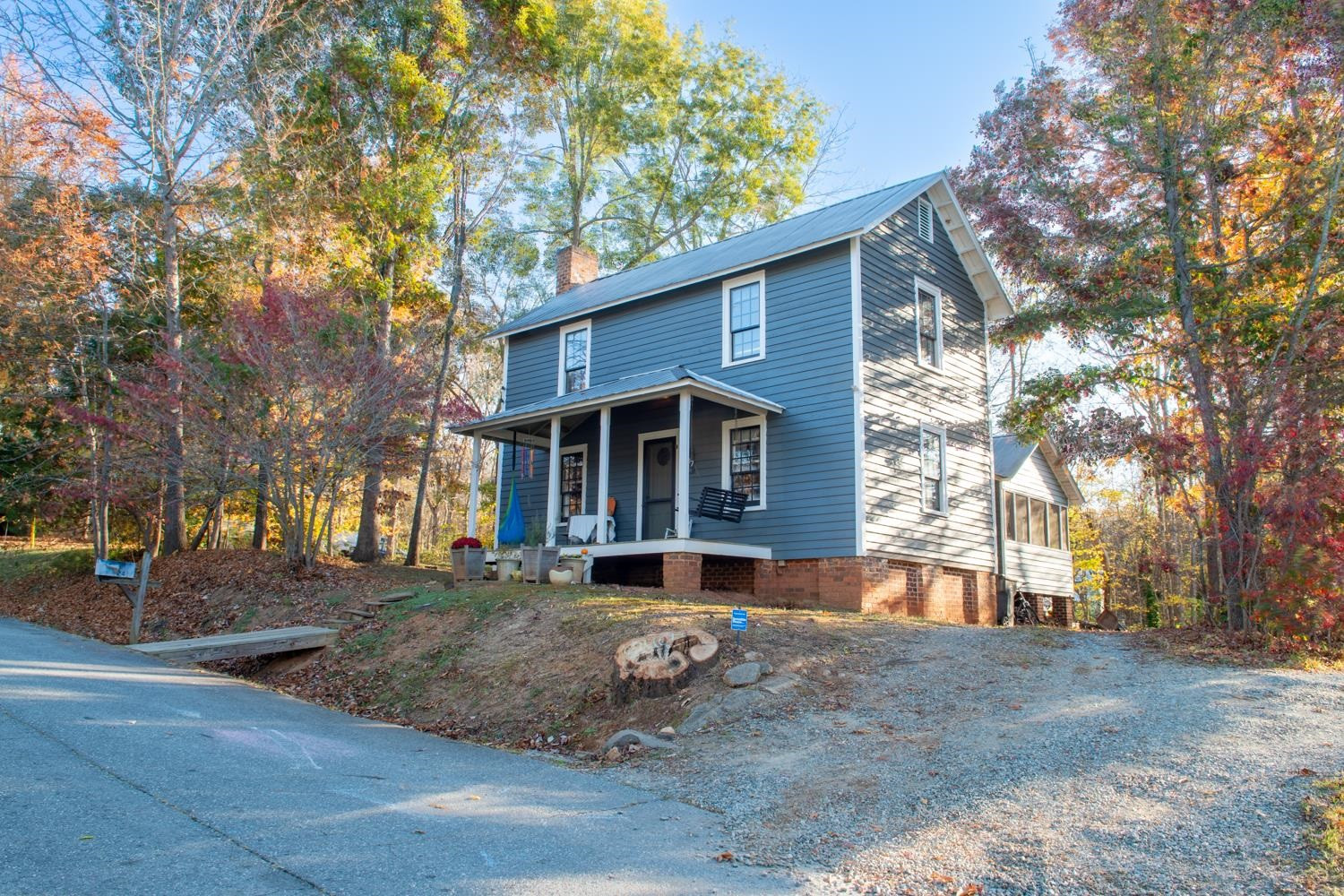 2417 Hodges Road Burlington, NC 27217 - Photo 25 of 30 a front view of a house with garden